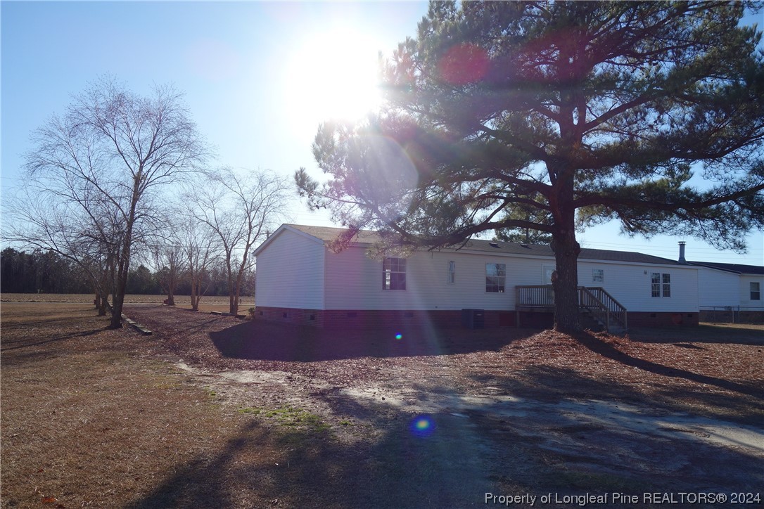 3001 Popes Crossing Road Lumberton, NC 28358 - Photo 40 of 43 a house view with a backyard space