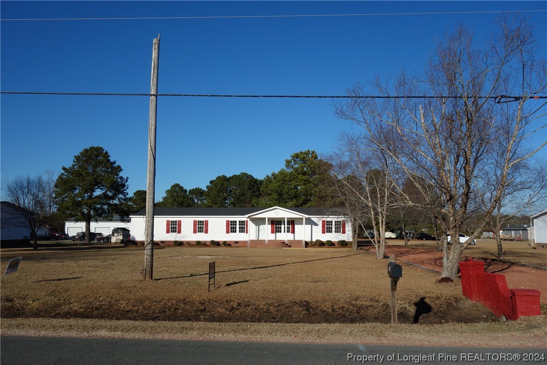 3001 Popes Crossing Road Lumberton, NC 28358 - Photo 43 of 43 a view of a street with houses