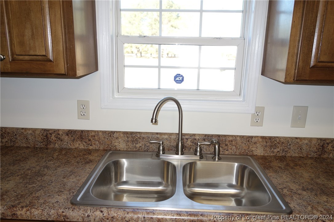 3001 Popes Crossing Road Lumberton, NC 28358 - Photo 6 of 43 a close view of sink and tap