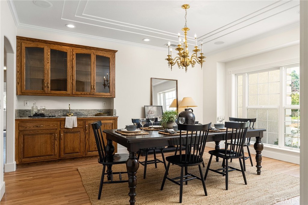 897 Filbert Avenue Chico, CA 95926 - Photo 21 of 66 a view of a dining room with furniture window and wooden floor
