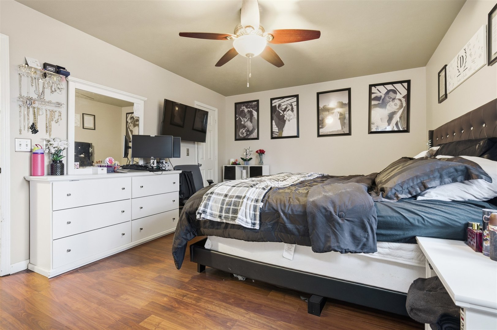 901 Charlotte Drive Normal, IL 61761 - Photo 18 of 32 a bedroom with a bed and a flat screen tv