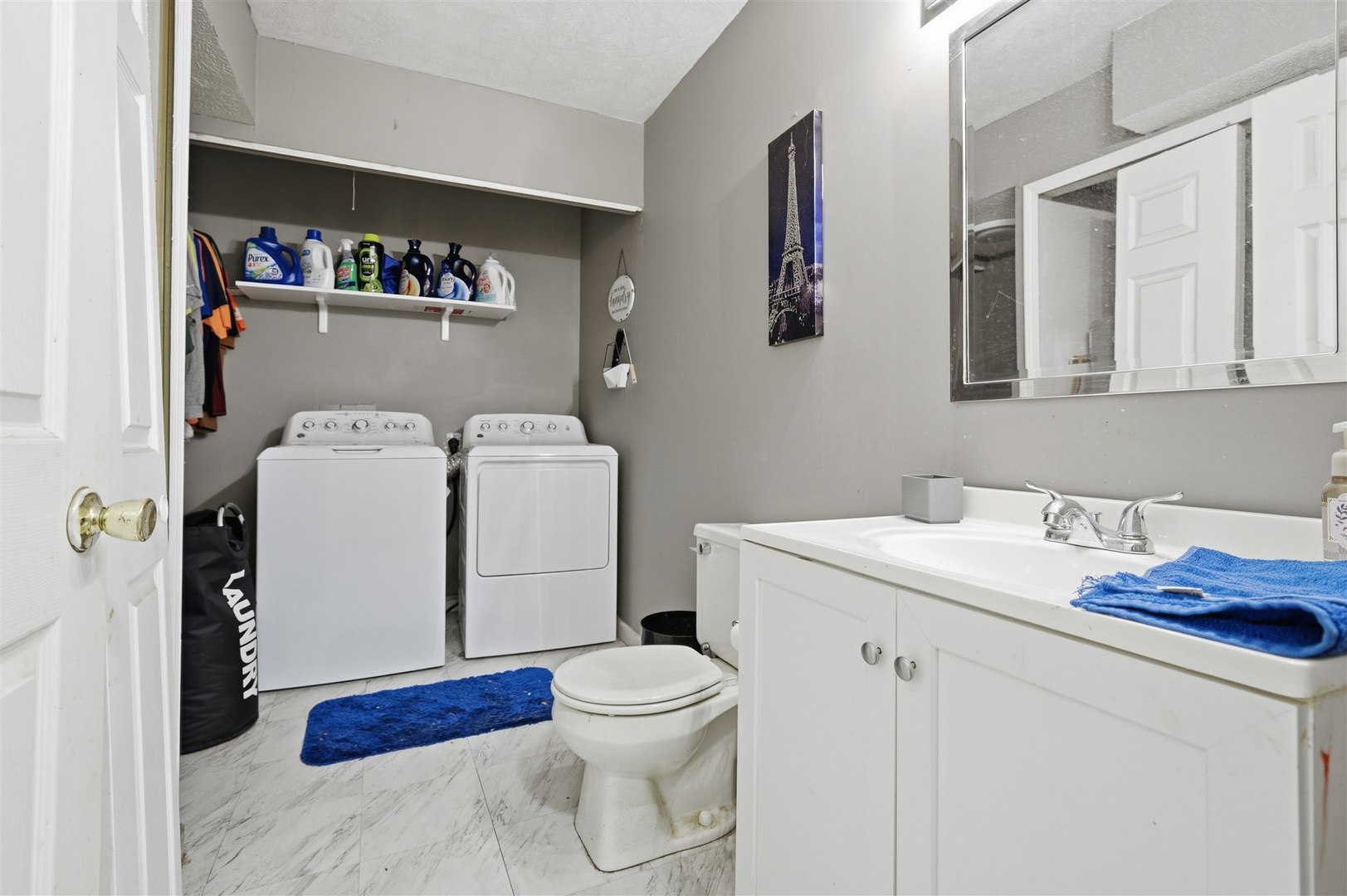 901 Charlotte Drive Normal, IL 61761 - Photo 23 of 32 a bathroom with a sink a toilet and a vanity