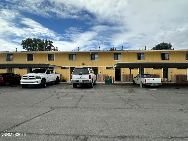 a view of a car parked in parking lot