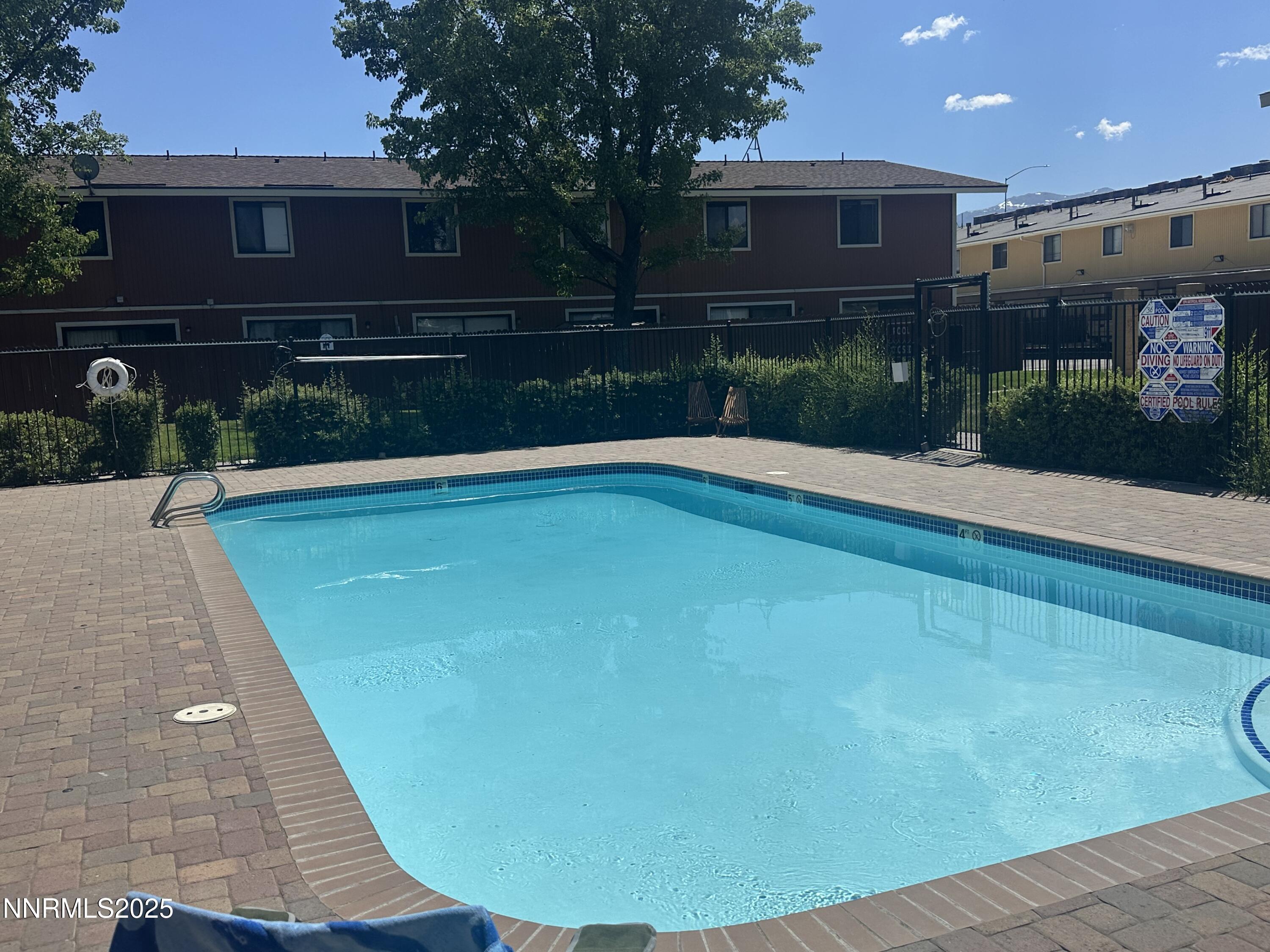 863 Nutmeg Place, Unit 12 Reno, NV 89502 - Photo 21 of 31 a view of outdoor space yard and swimming pool