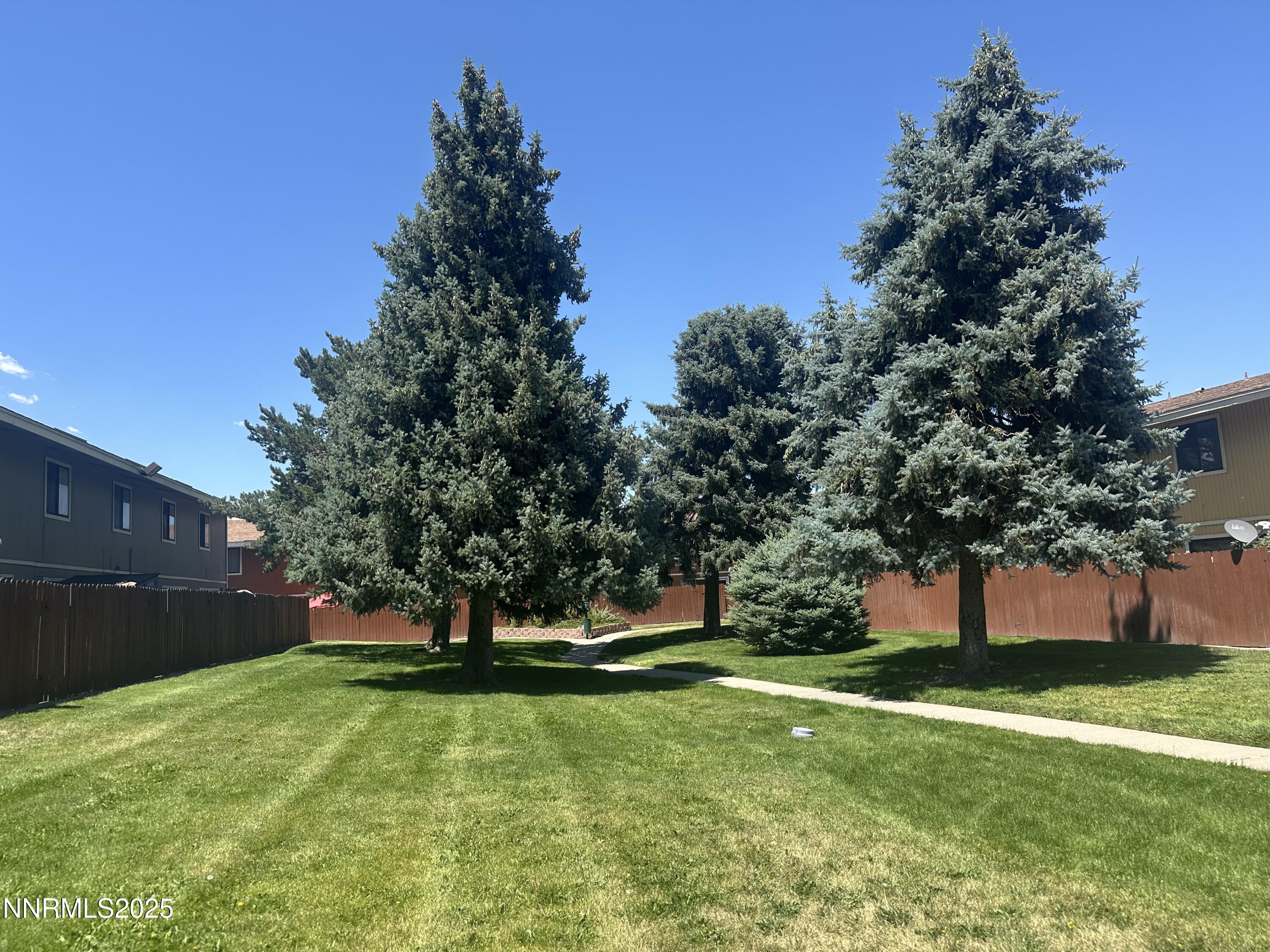 863 Nutmeg Place, Unit 12 Reno, NV 89502 - Photo 24 of 31 a view of a park with large trees