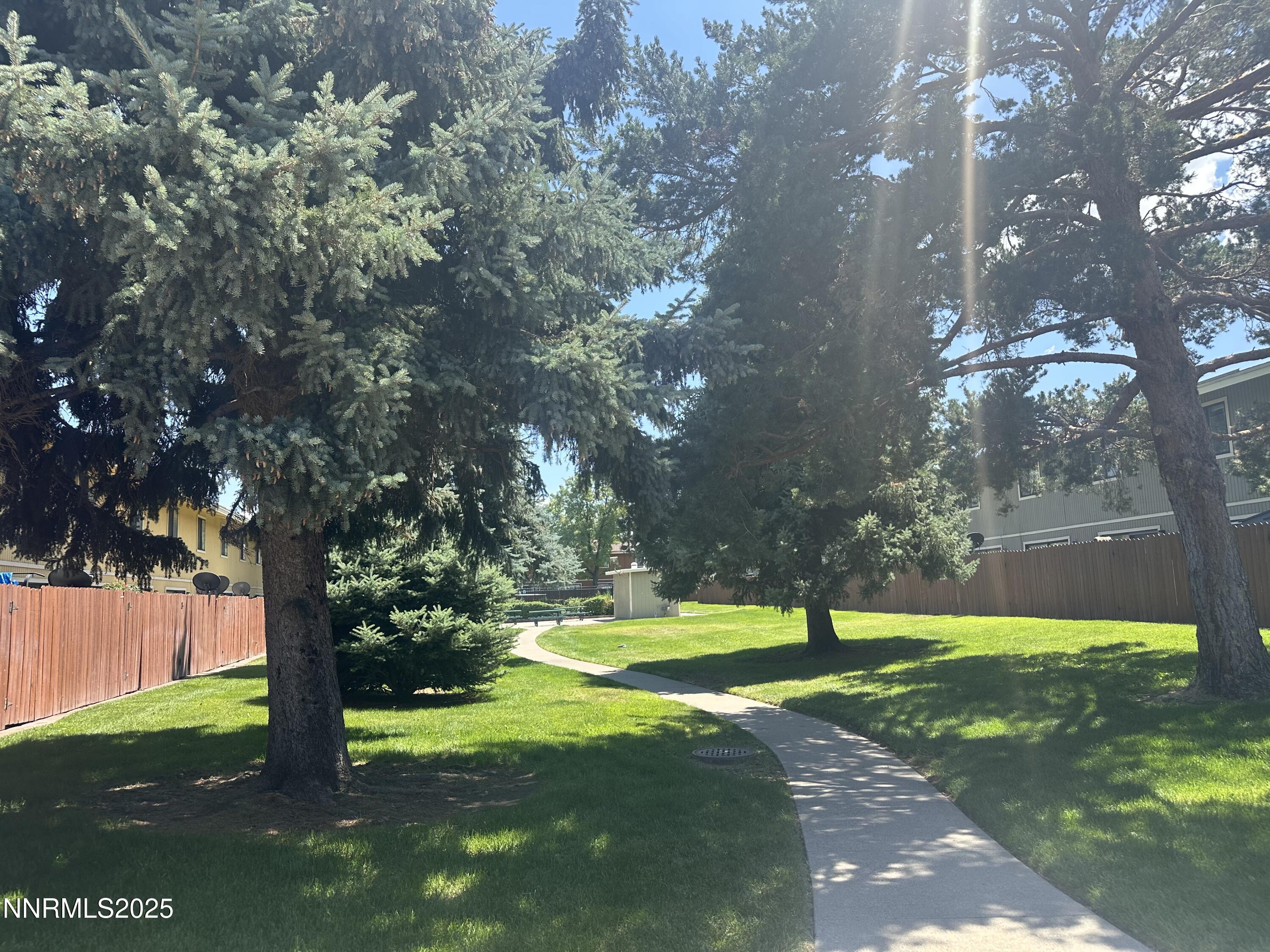 863 Nutmeg Place, Unit 12 Reno, NV 89502 - Photo 25 of 31 a view of a park with large trees