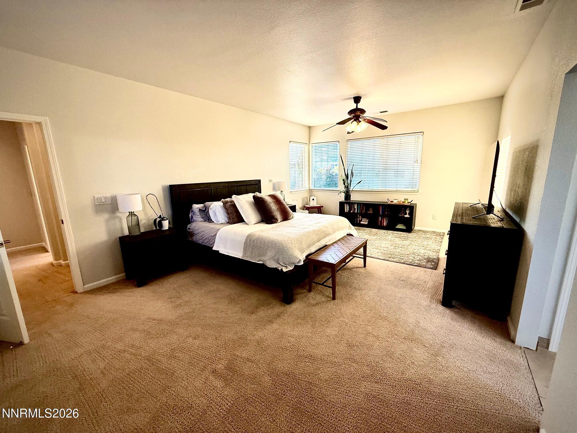 1771 Emerald Bay Drive Reno, NV 89521 - Photo 14 of 31 a living room with furniture and a fireplace