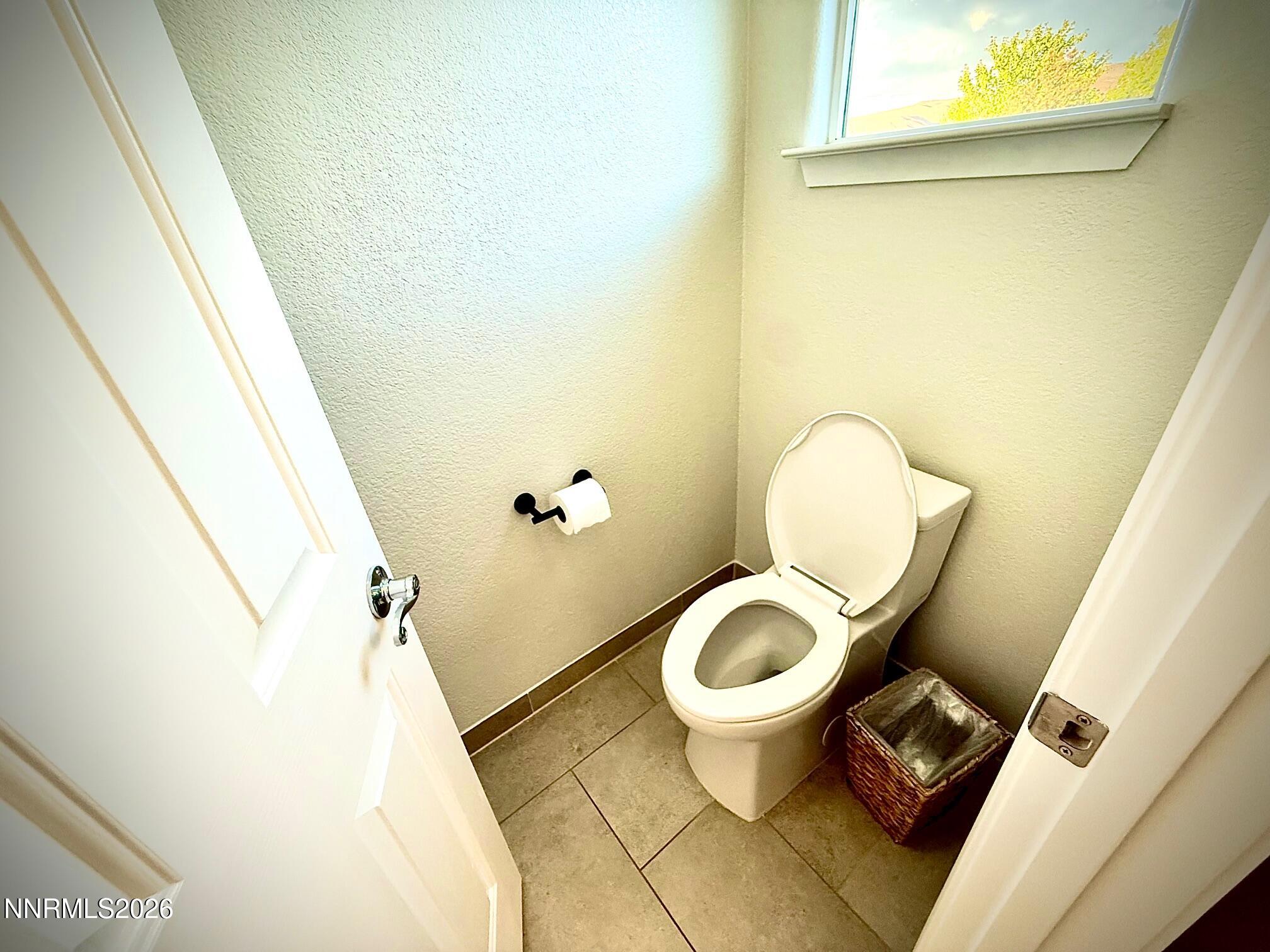 1771 Emerald Bay Drive Reno, NV 89521 - Photo 17 of 31 a bathroom with a sink and a toilet