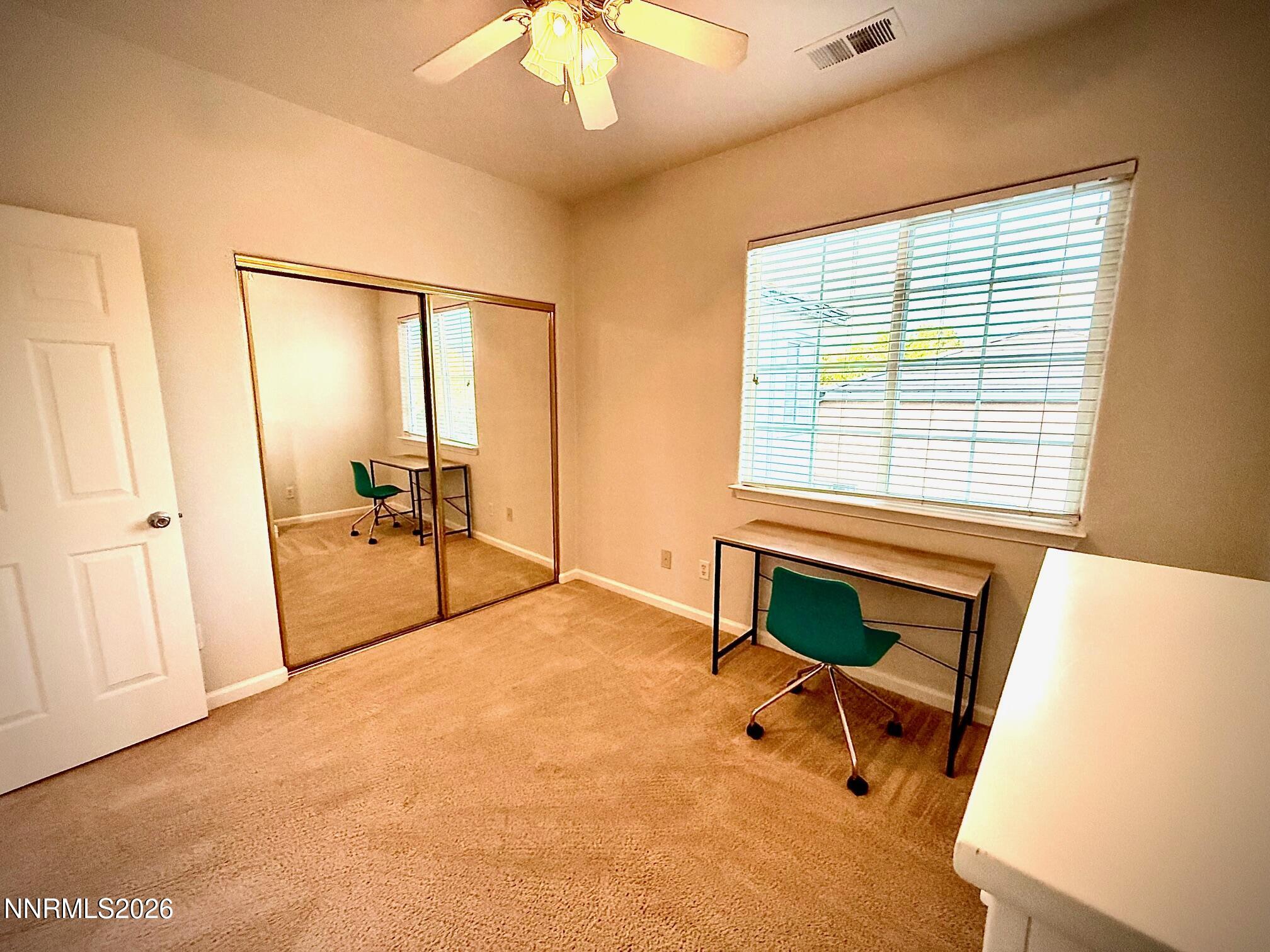 1771 Emerald Bay Drive Reno, NV 89521 - Photo 25 of 31 a bedroom with furniture and a window