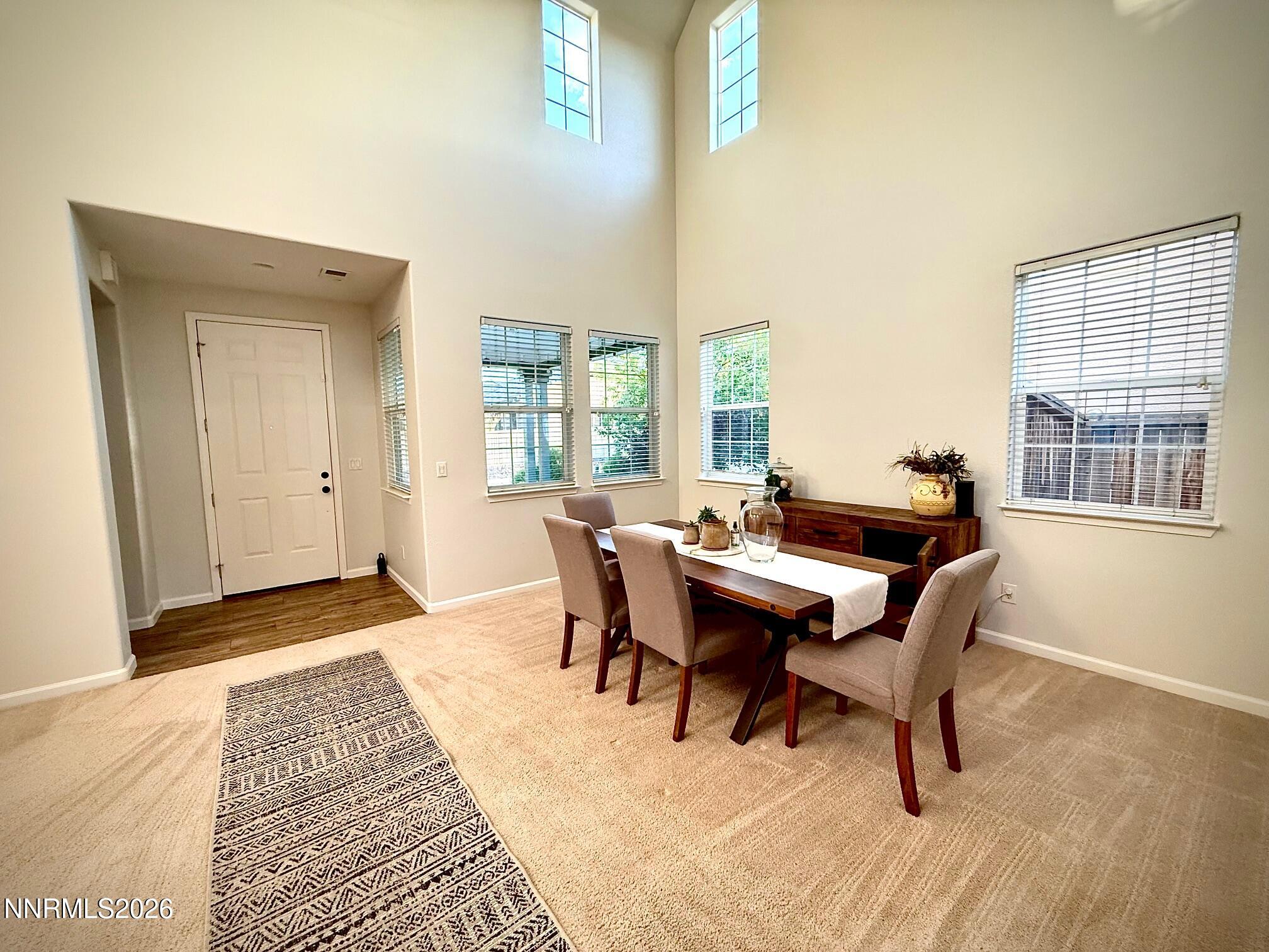 1771 Emerald Bay Drive Reno, NV 89521 - Photo 4 of 31 a view of a dining room with furniture and window