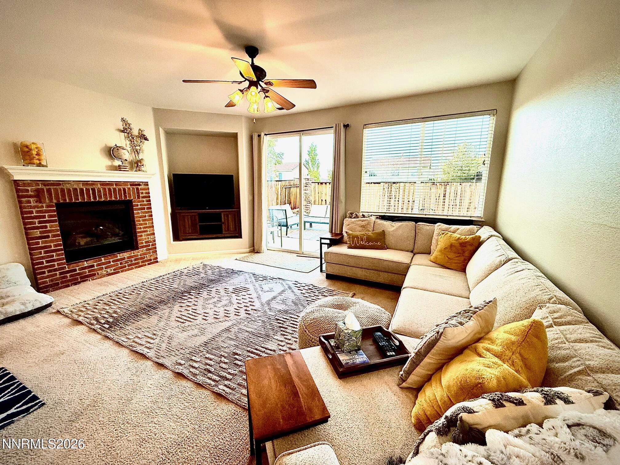 1771 Emerald Bay Drive Reno, NV 89521 - Photo 7 of 31 a bedroom with furniture and a fireplace