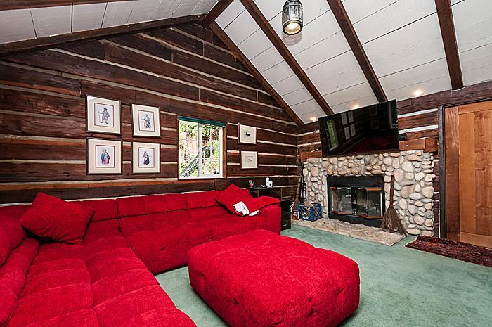 47 Skylonda Drive Woodside, CA 94062 - Photo 11 of 16 a living room with furniture with a fireplace