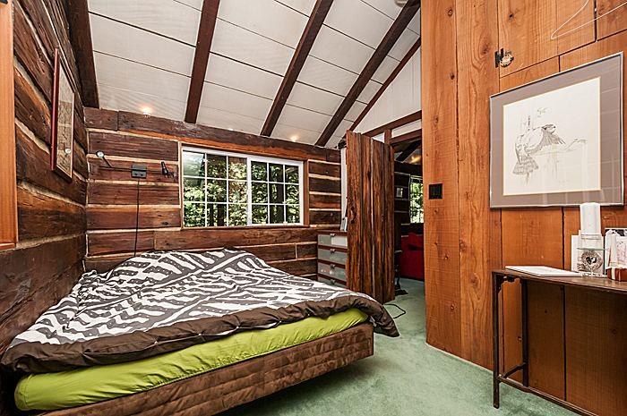 47 Skylonda Drive Woodside, CA 94062 - Photo 4 of 16 a bedroom with a bed and wooden floor