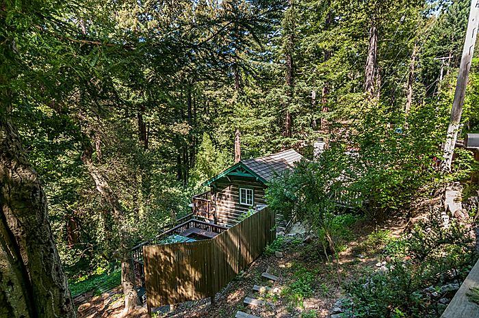 47 Skylonda Drive Woodside, CA 94062 - Photo 5 of 16 a backyard of a house with lots of green space