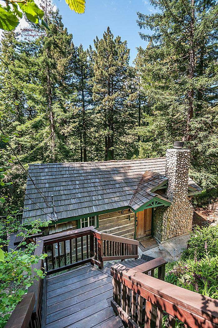 47 Skylonda Drive Woodside, CA 94062 - Photo 6 of 16 a view of a house with wooden deck and furniture