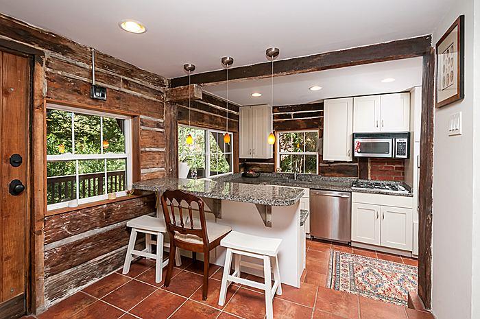 47 Skylonda Drive Woodside, CA 94062 - Photo 8 of 16 a kitchen with granite countertop lots of counter top space and stainless steel appliances