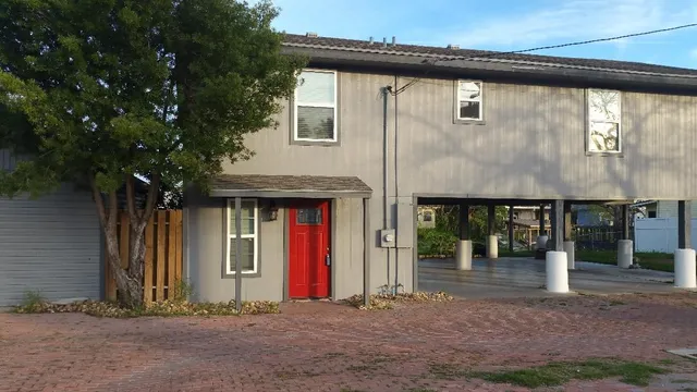 a front view of a house with yard
