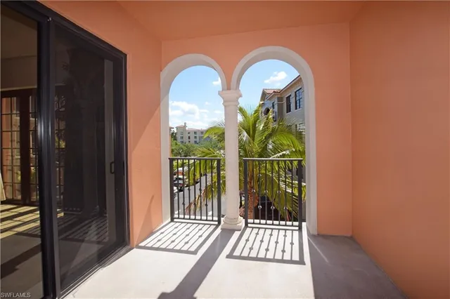 a room with gym equipment and large mirror