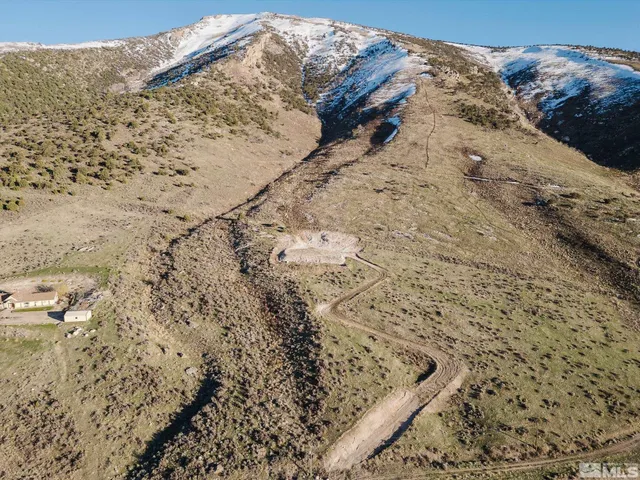 a view of wooden fence of snow