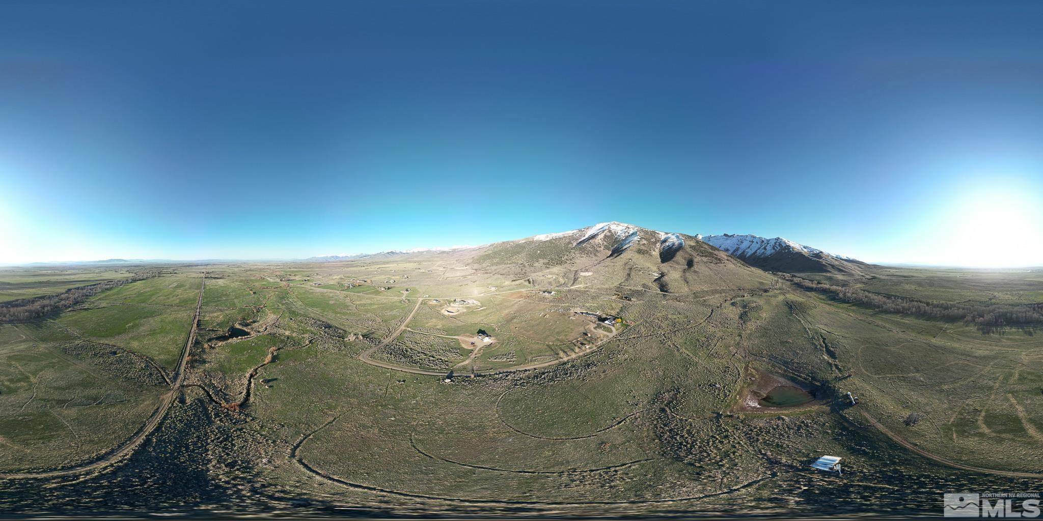 Tbd Sustacha Drive Lamoille, NV 89828 - Photo 4 of 27 a view of a fireplace in a field