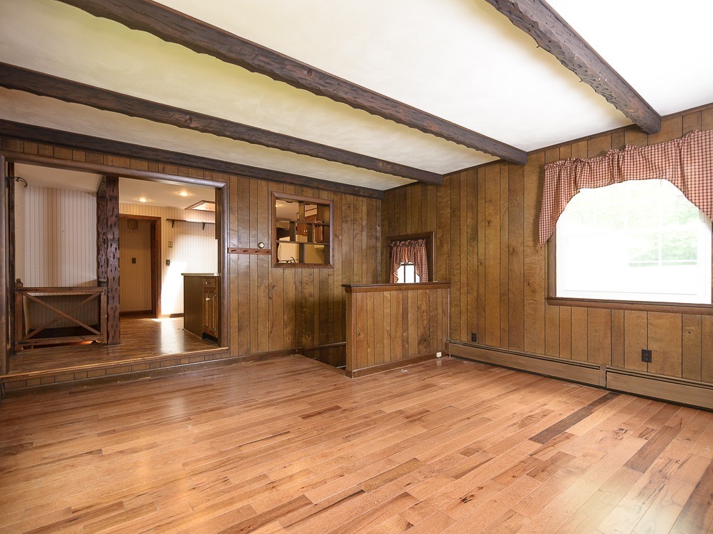 19 8 Lots Road Sutton, MA 01590 - Photo 13 of 30 a view of empty room with wooden floor