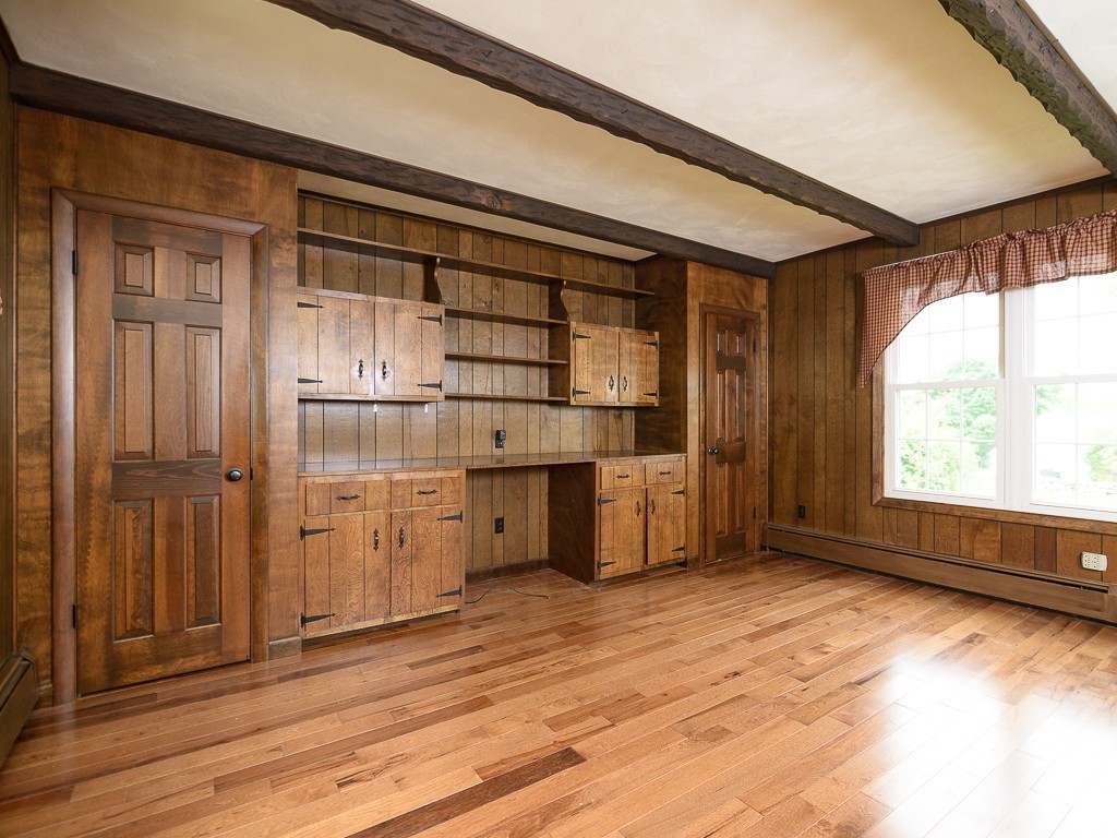 19 8 Lots Road Sutton, MA 01590 - Photo 14 of 30 a view of empty room with cabinet and window
