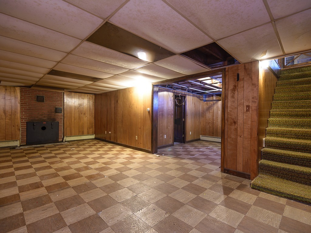 19 8 Lots Road Sutton, MA 01590 - Photo 23 of 30 a view of an empty room with stairs