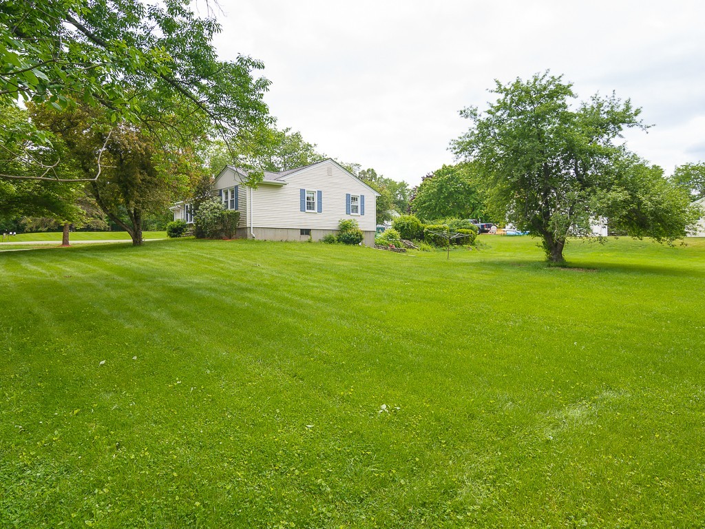 19 8 Lots Road Sutton, MA 01590 - Photo 27 of 30 a front view of a house with a yard