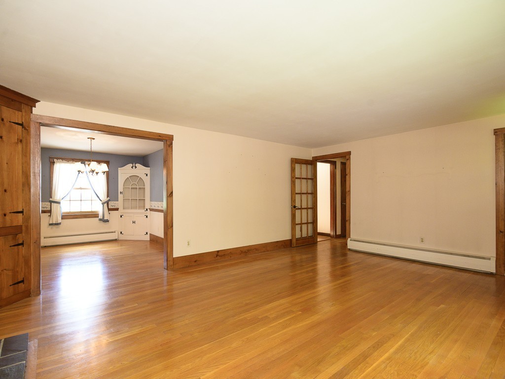 19 8 Lots Road Sutton, MA 01590 - Photo 4 of 30 a view of an empty room and window