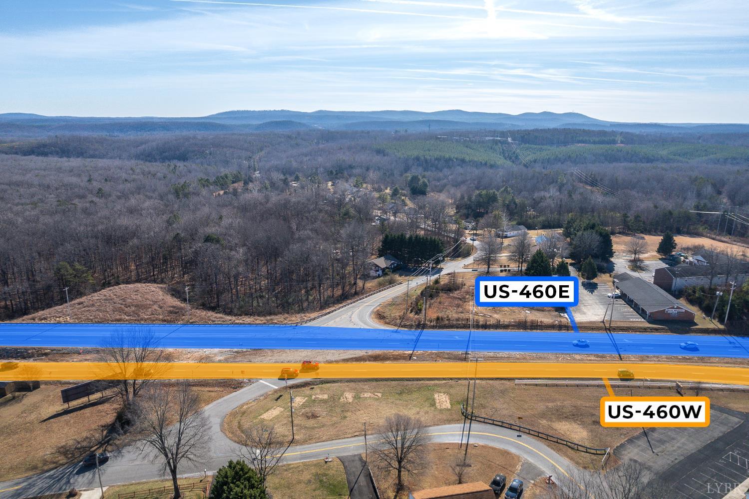 286 Rockwell Road Lynchburg, VA 24504 - Photo 2 of 19 a view of outdoor space with swimming pool and trees