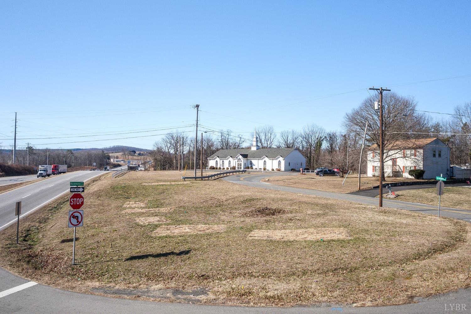 286 Rockwell Road Lynchburg, VA 24504 - Photo 4 of 19 a view of a dry yard with large trees