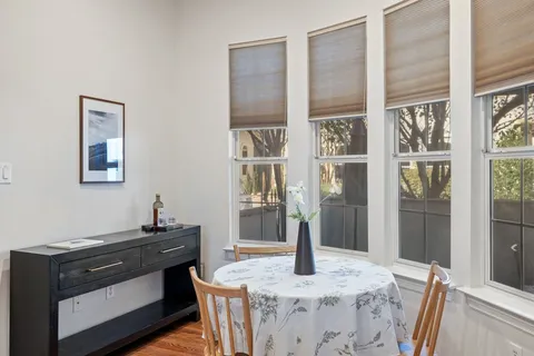 a bedroom with bed and a couch