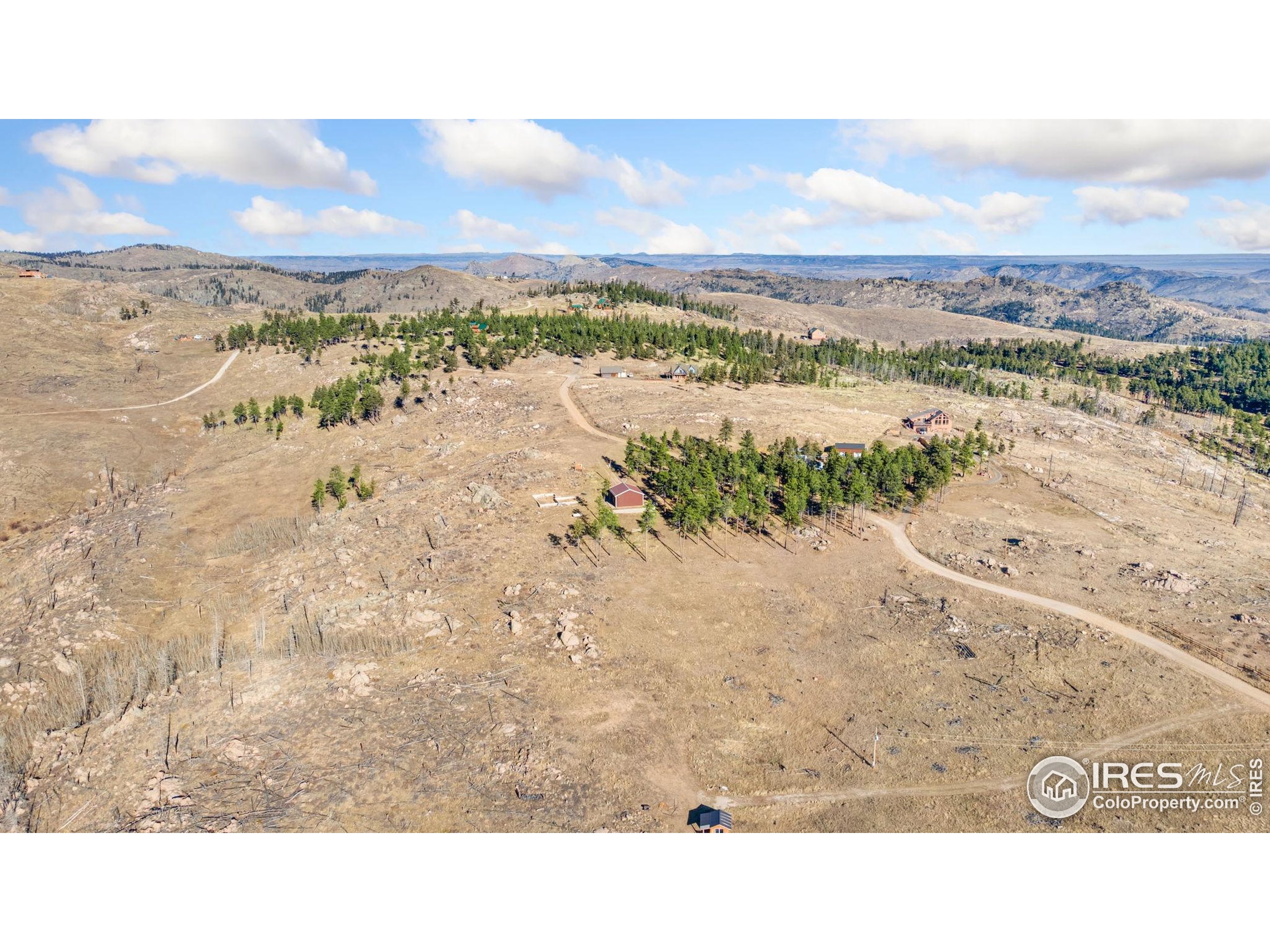3434 Davis Ranch Road Bellvue, CO 80512 - Photo 14 of 30 a black and white photo of a beach