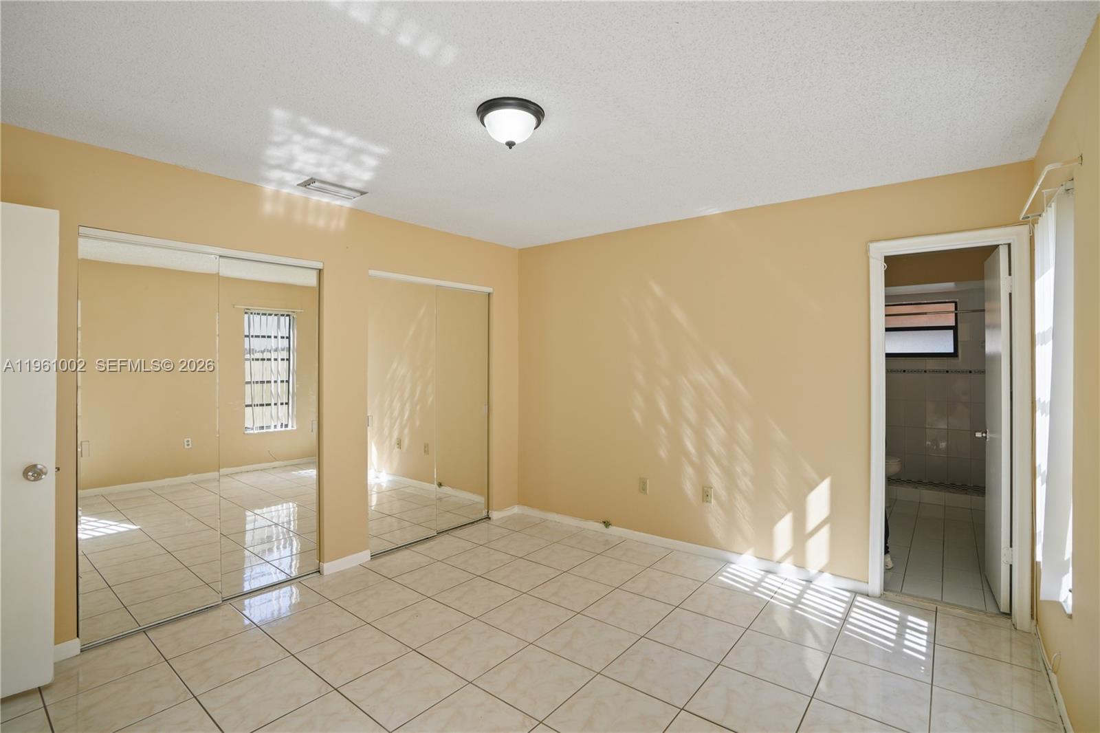 6227 Southwest 135th Avenue Miami, FL 33183 - Photo 16 of 24 a view of a room with wooden floor and cabinet