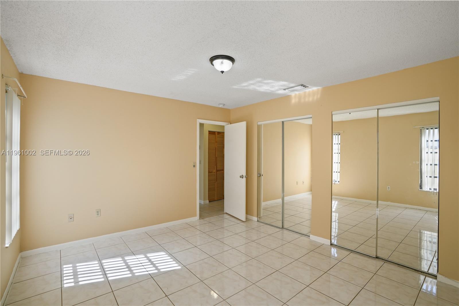6227 Southwest 135th Avenue Miami, FL 33183 - Photo 17 of 24 a view of an empty room