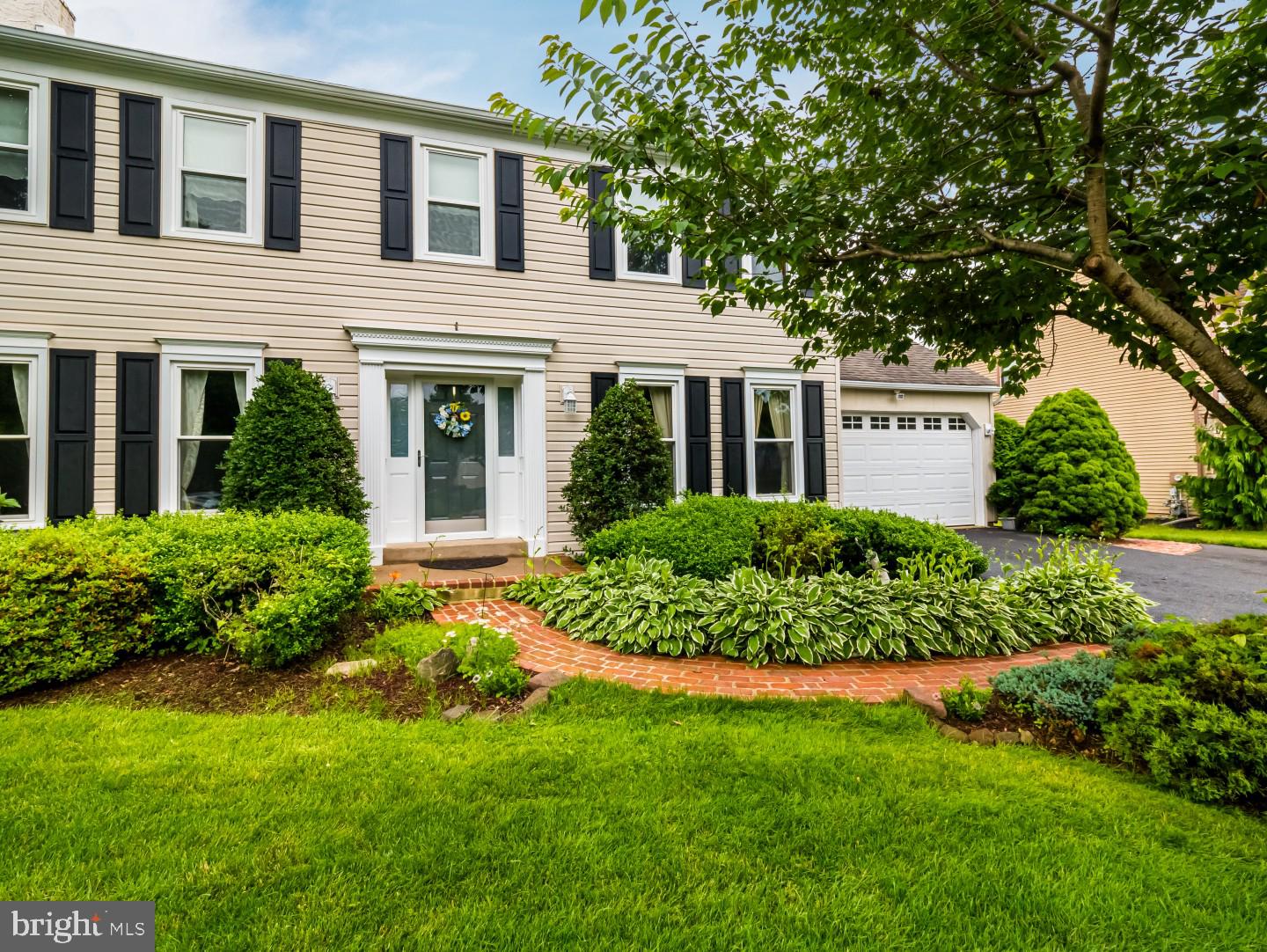 281 Cliveden Drive Newtown, PA 18940 - Photo 2 of 35 a view of a house with a yard and plants
