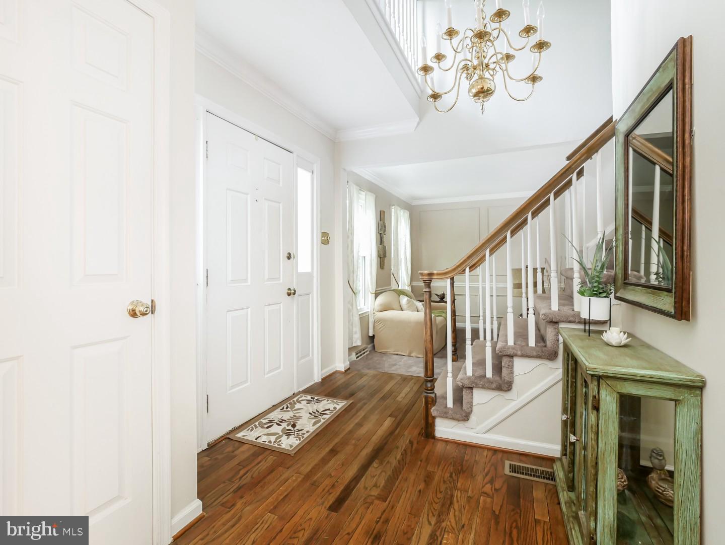 281 Cliveden Drive Newtown, PA 18940 - Photo 11 of 35 a view of entryway and hall with wooden floor