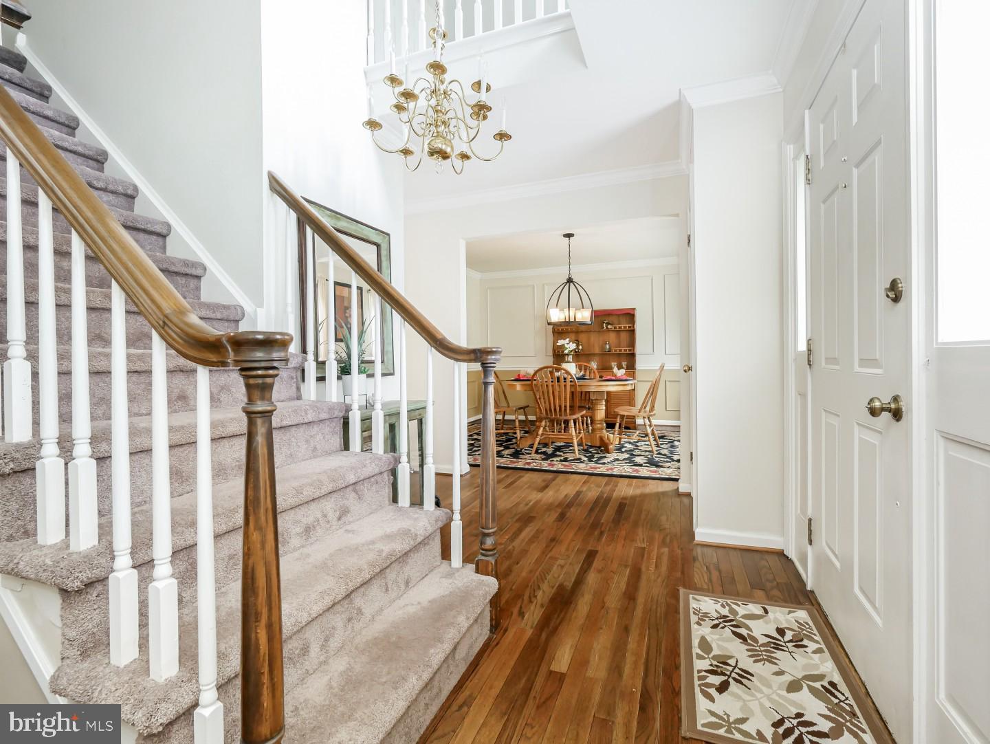 281 Cliveden Drive Newtown, PA 18940 - Photo 12 of 35 a view of a hallway with wooden floor and staircase