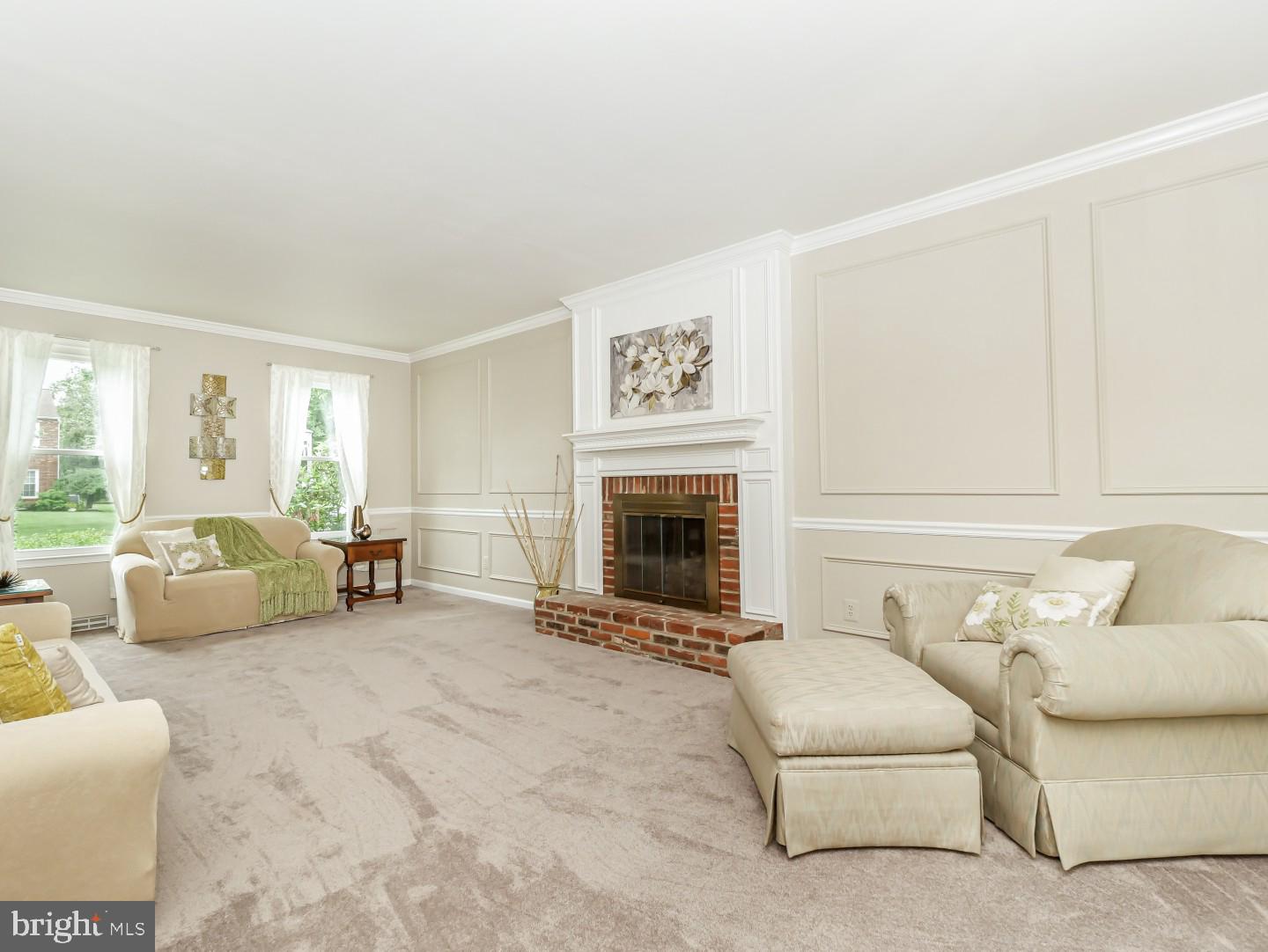 281 Cliveden Drive Newtown, PA 18940 - Photo 13 of 35 a living room with furniture and a fireplace