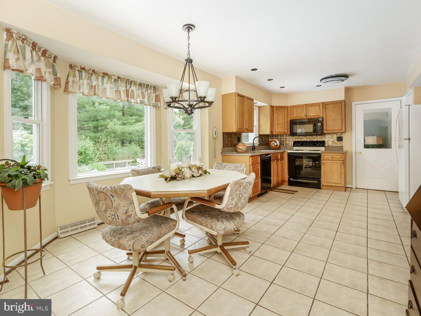 281 Cliveden Drive Newtown, PA 18940 - Photo 17 of 35 a view of a dining room with furniture window and outside view