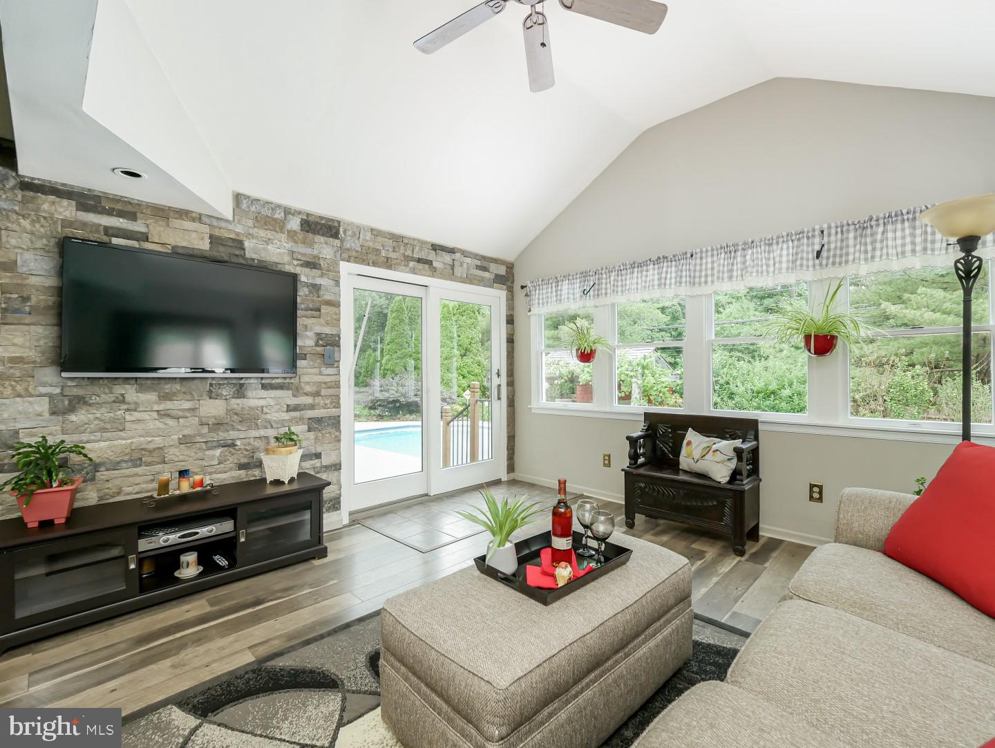 281 Cliveden Drive Newtown, PA 18940 - Photo 24 of 35 a living room with furniture and a flat screen tv