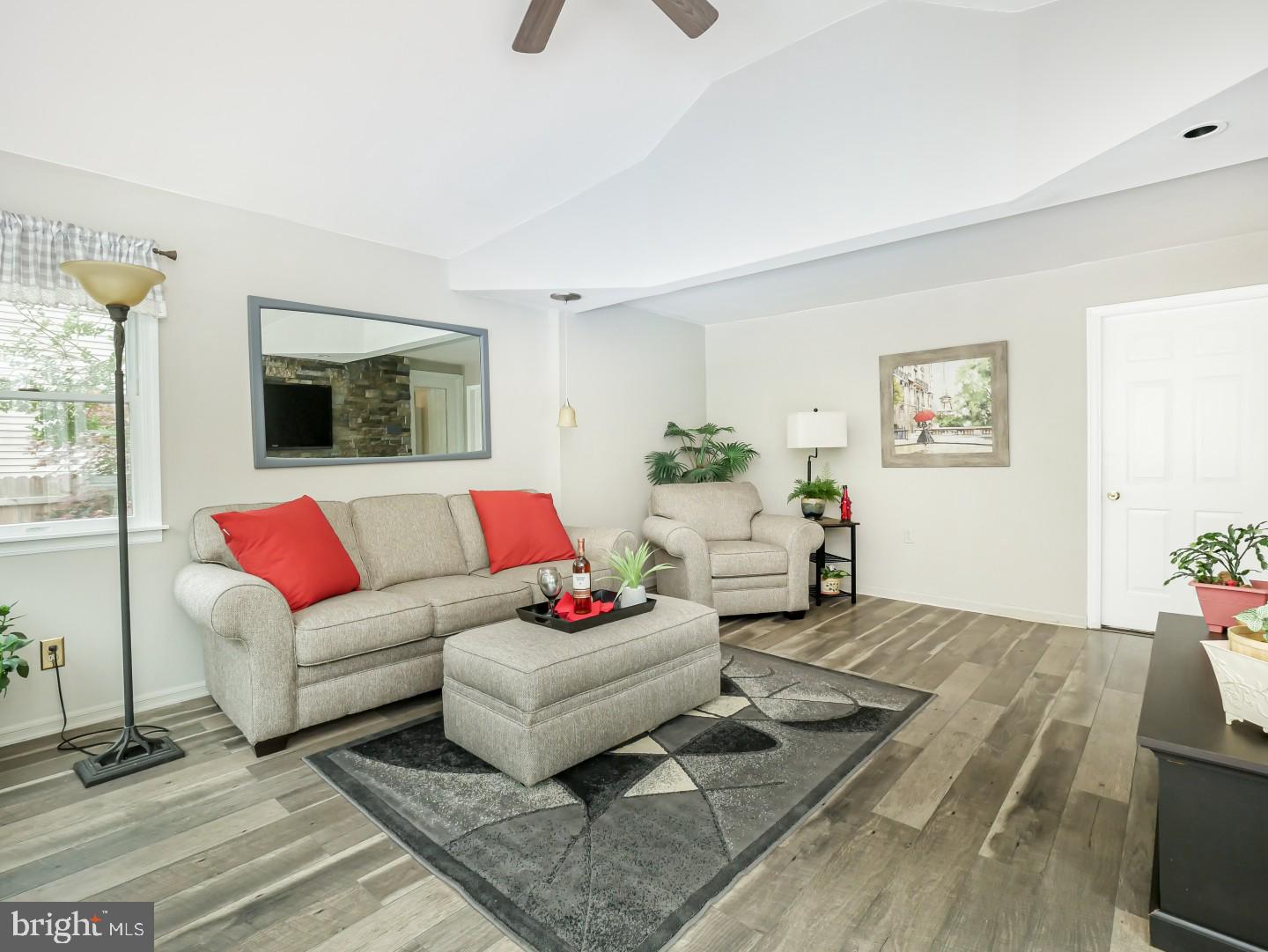 281 Cliveden Drive Newtown, PA 18940 - Photo 25 of 35 a living room with furniture and a flat screen tv