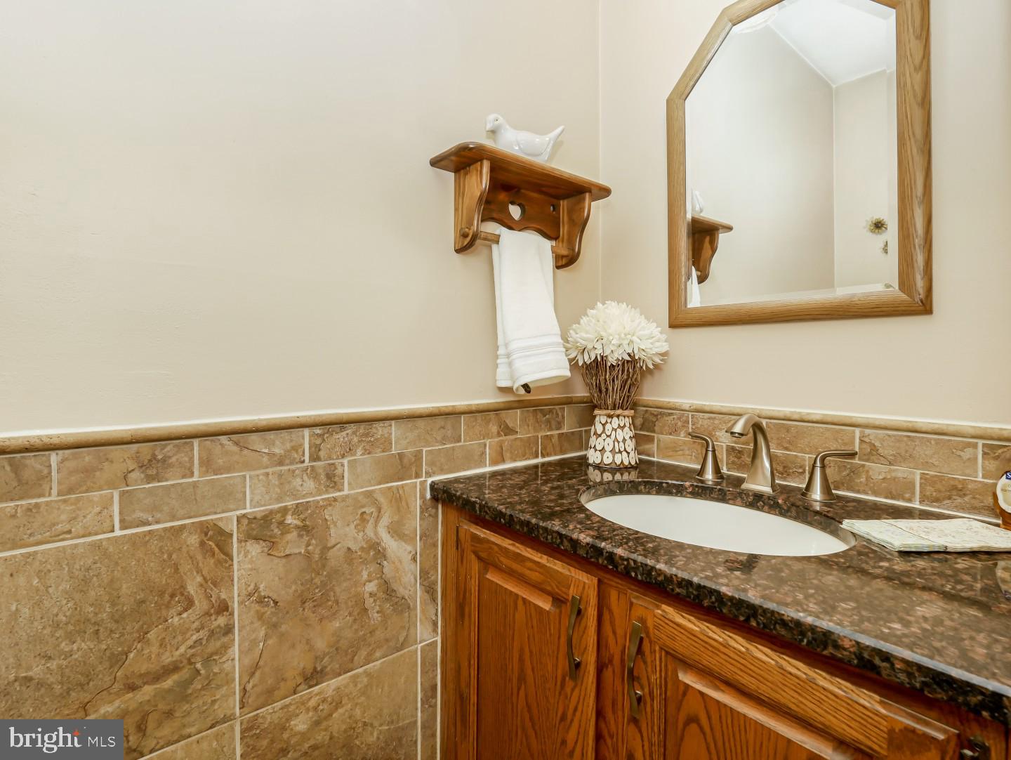 281 Cliveden Drive Newtown, PA 18940 - Photo 32 of 35 a bathroom with a granite countertop sink and a mirror