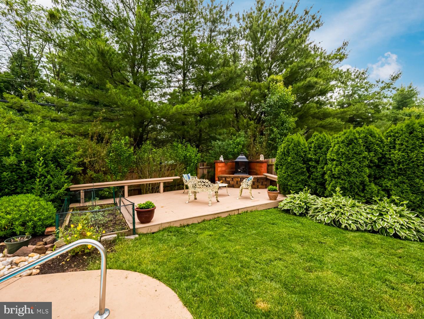 281 Cliveden Drive Newtown, PA 18940 - Photo 5 of 35 a view of a chair and table in the garden