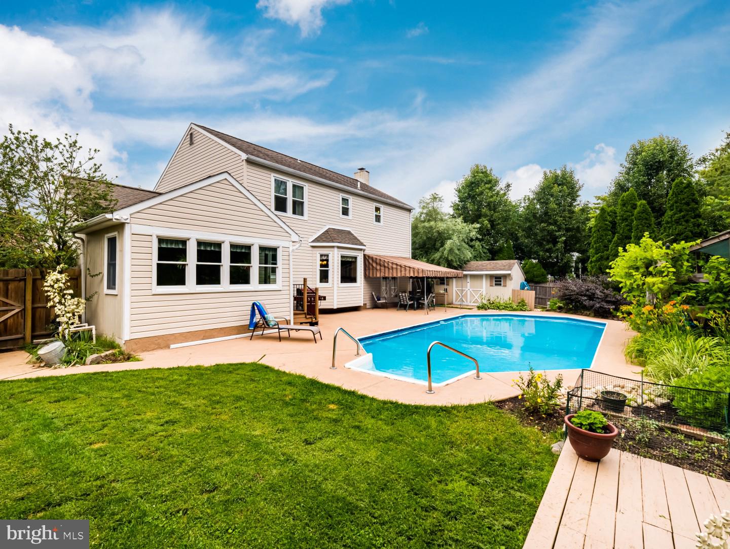 281 Cliveden Drive Newtown, PA 18940 - Photo 6 of 35 a view of a house with pool and sitting area