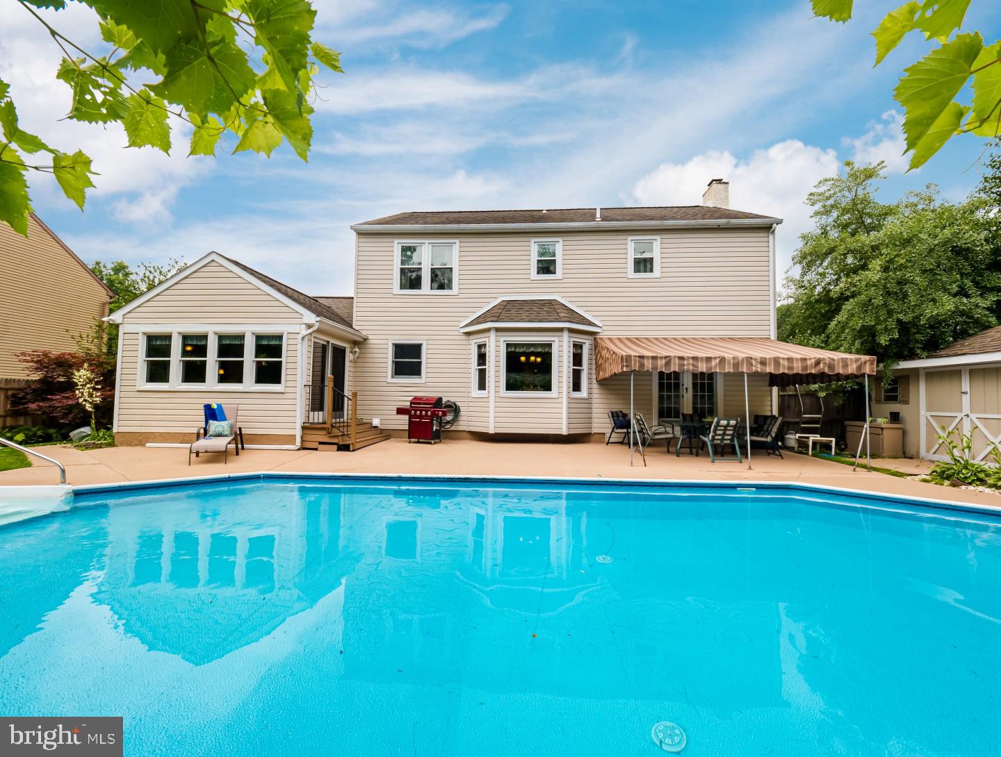 281 Cliveden Drive Newtown, PA 18940 - Photo 9 of 35 a front view of a house with swimming pool having outdoor seating