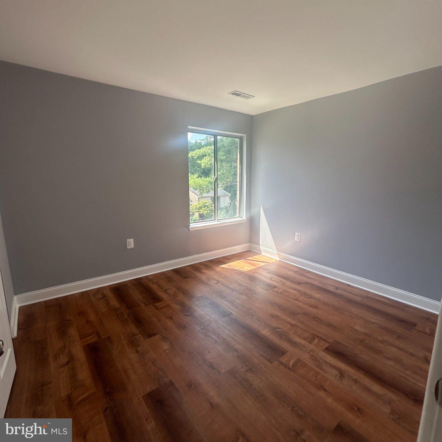 10549 Twin Rivers Road, Unit E1 Columbia, MD 21044 - Photo 17 of 20 Bright and airy bedroom 2.