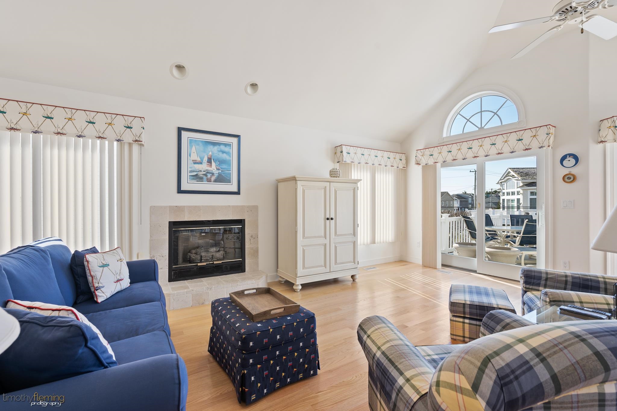 13 12th Street Avalon, NJ 08202 - Photo 8 of 24 a living room with furniture and a fireplace