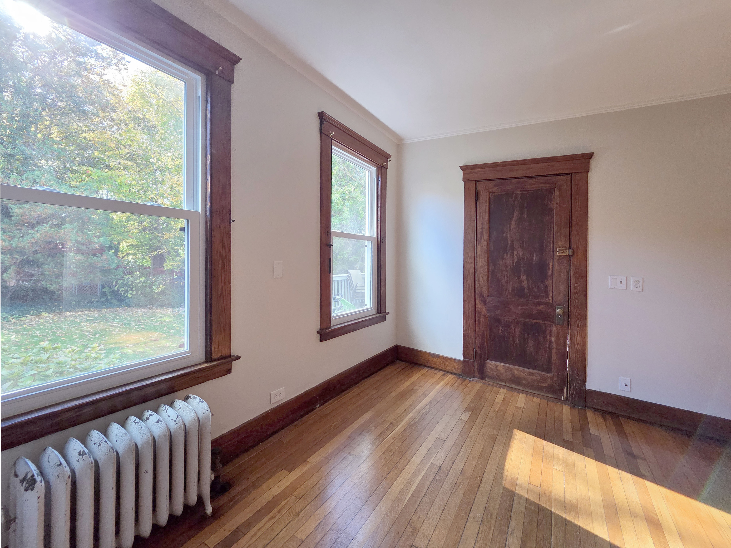 302 Lexington Avenue New Haven, CT 06513 - Photo 11 of 24 a view of a room with wooden floor and windows