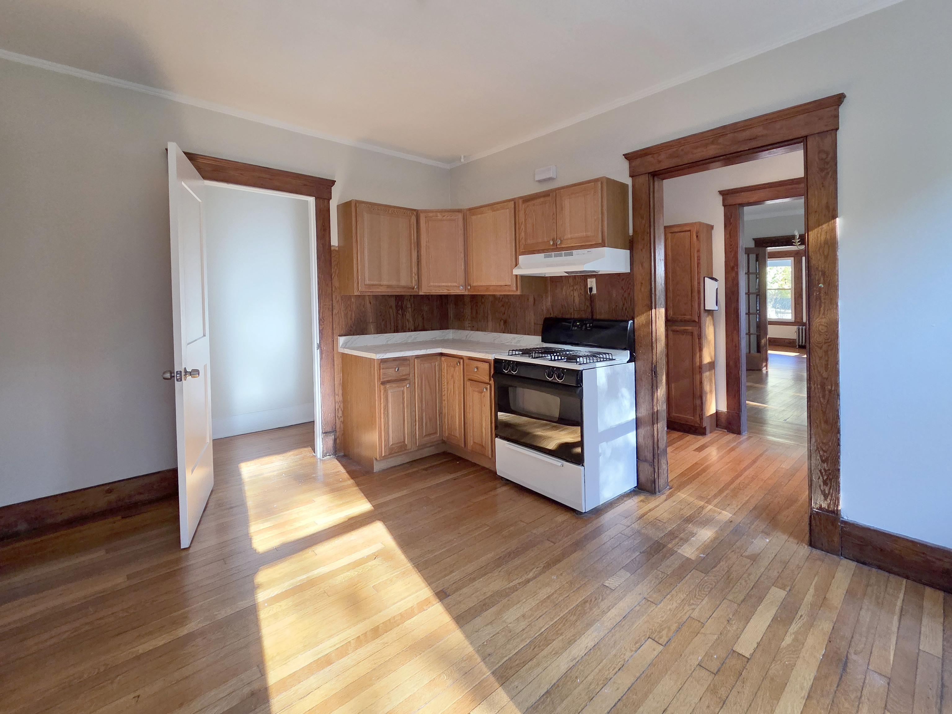 302 Lexington Avenue New Haven, CT 06513 - Photo 12 of 24 a kitchen with stainless steel appliances granite countertop a stove a sink and a microwave